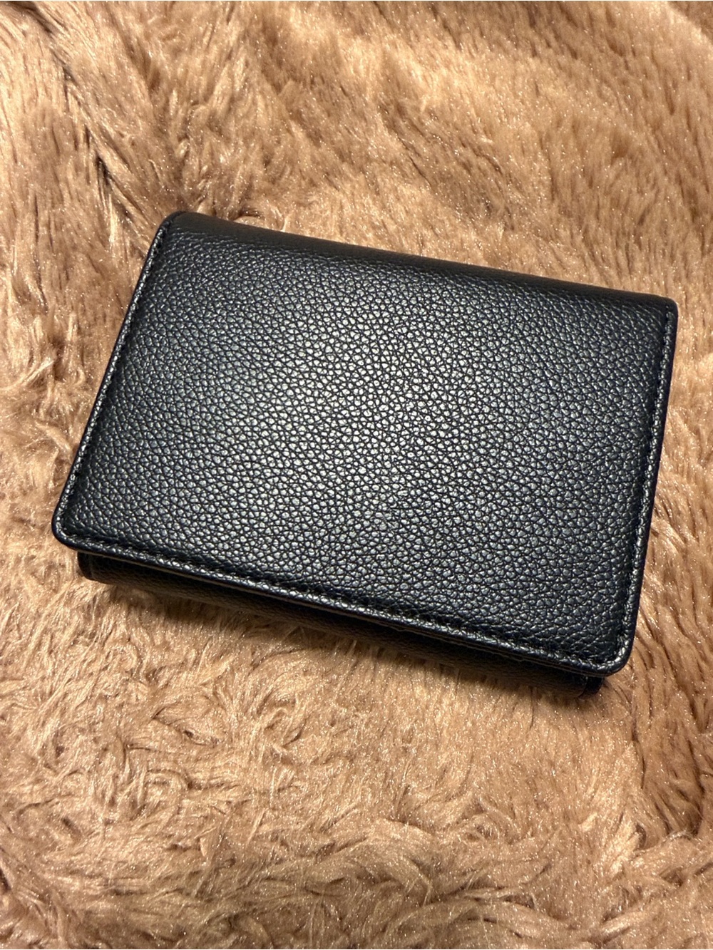 Women’s Black Leather Trifold Wallet with Snap Closure